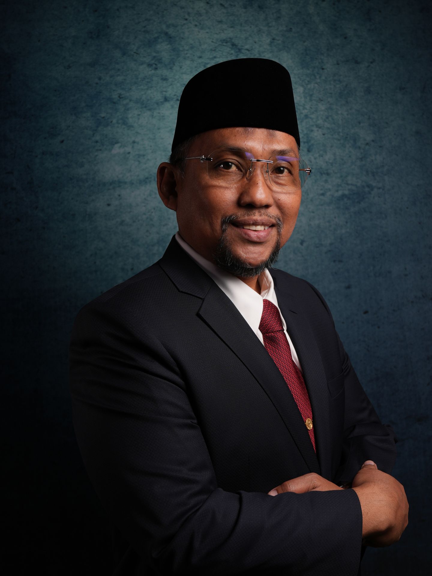 Profil :Dr. Muhammad Hasbi, S.Sos., M.Pd.